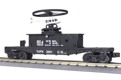 TV4 flatcar with operating helicopter