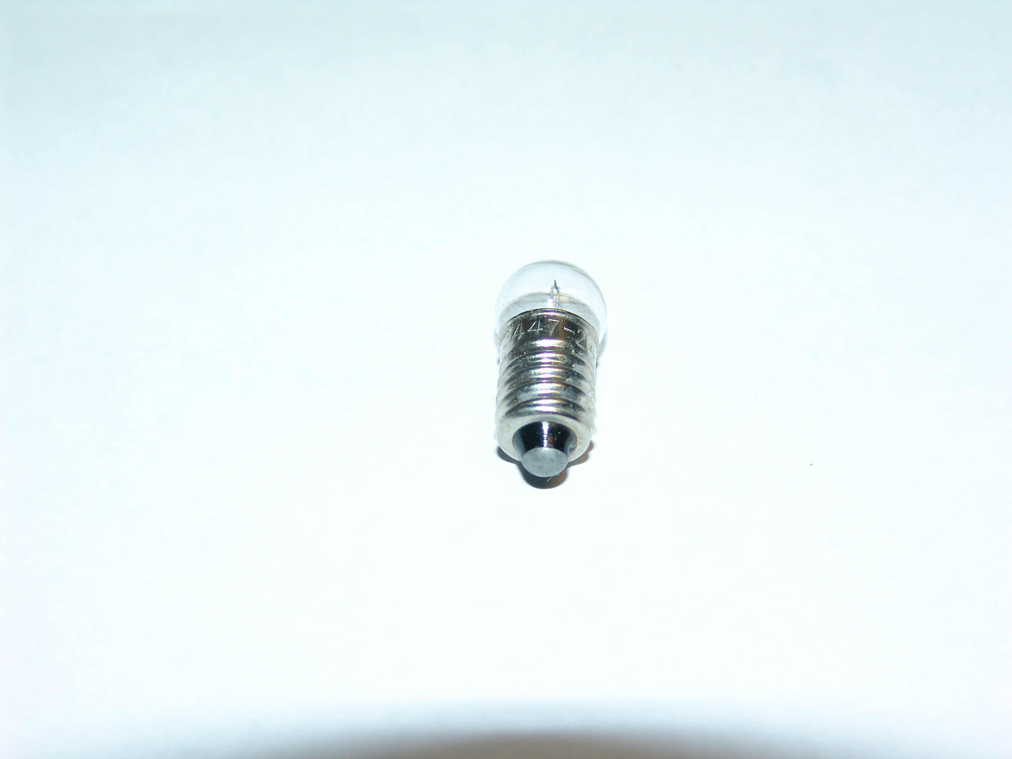 #2447 Clear 24V screw base light bulb