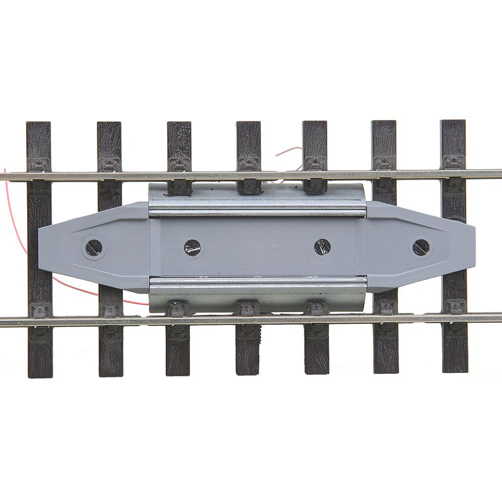 O Through-The-Track Delayed-Action Magne-Electric Uncoupler