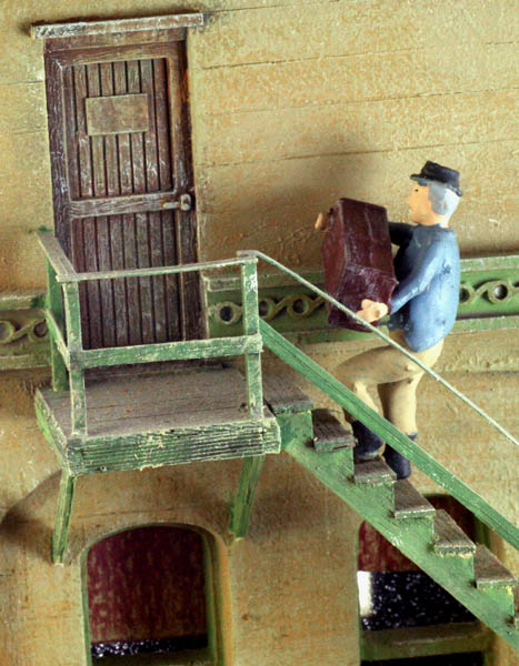 Lugging a Box Up Stairs figure