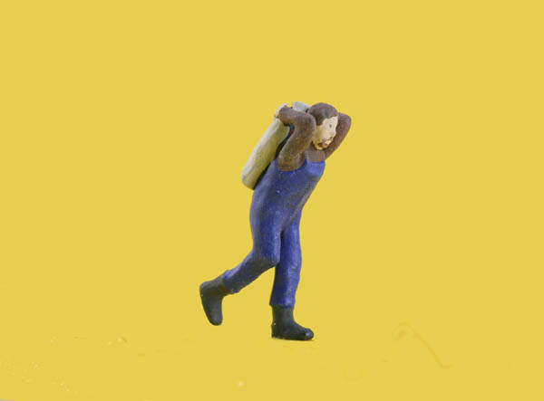 Coal Worker Lugging Coal Sack
