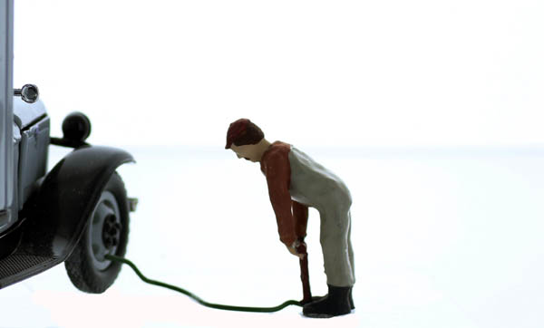 Figure Pumping up a Tire with Pump, Finished