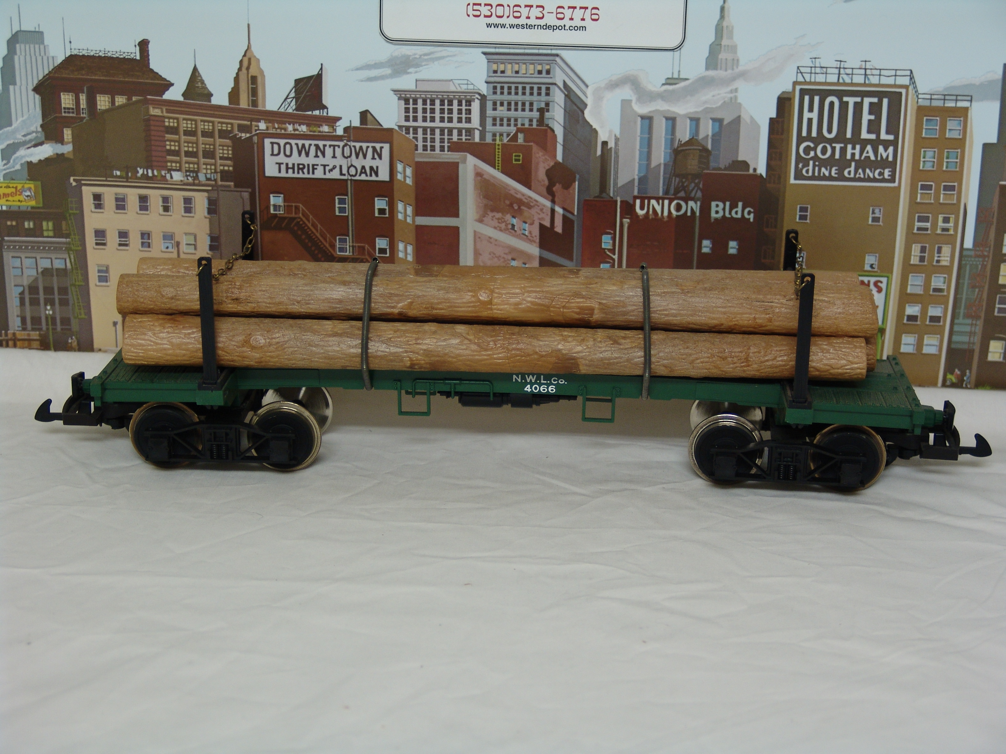 N.W.L. Co skeleton log car #4066 with log load