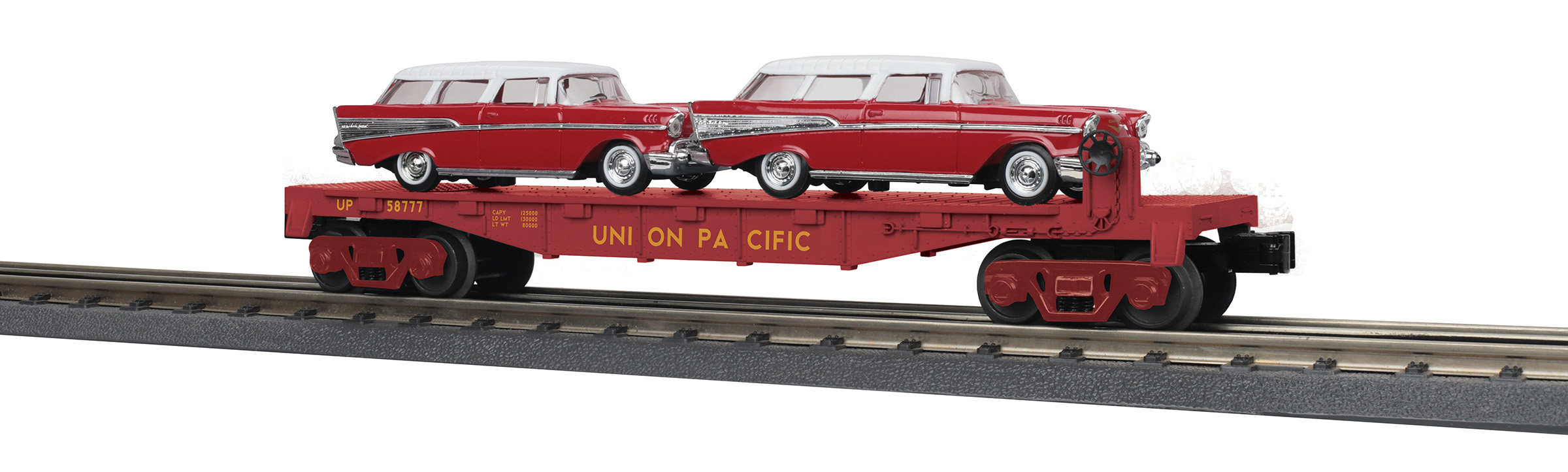 Union Pacific flatcar #58777 with two 1957 Chevy Nomads