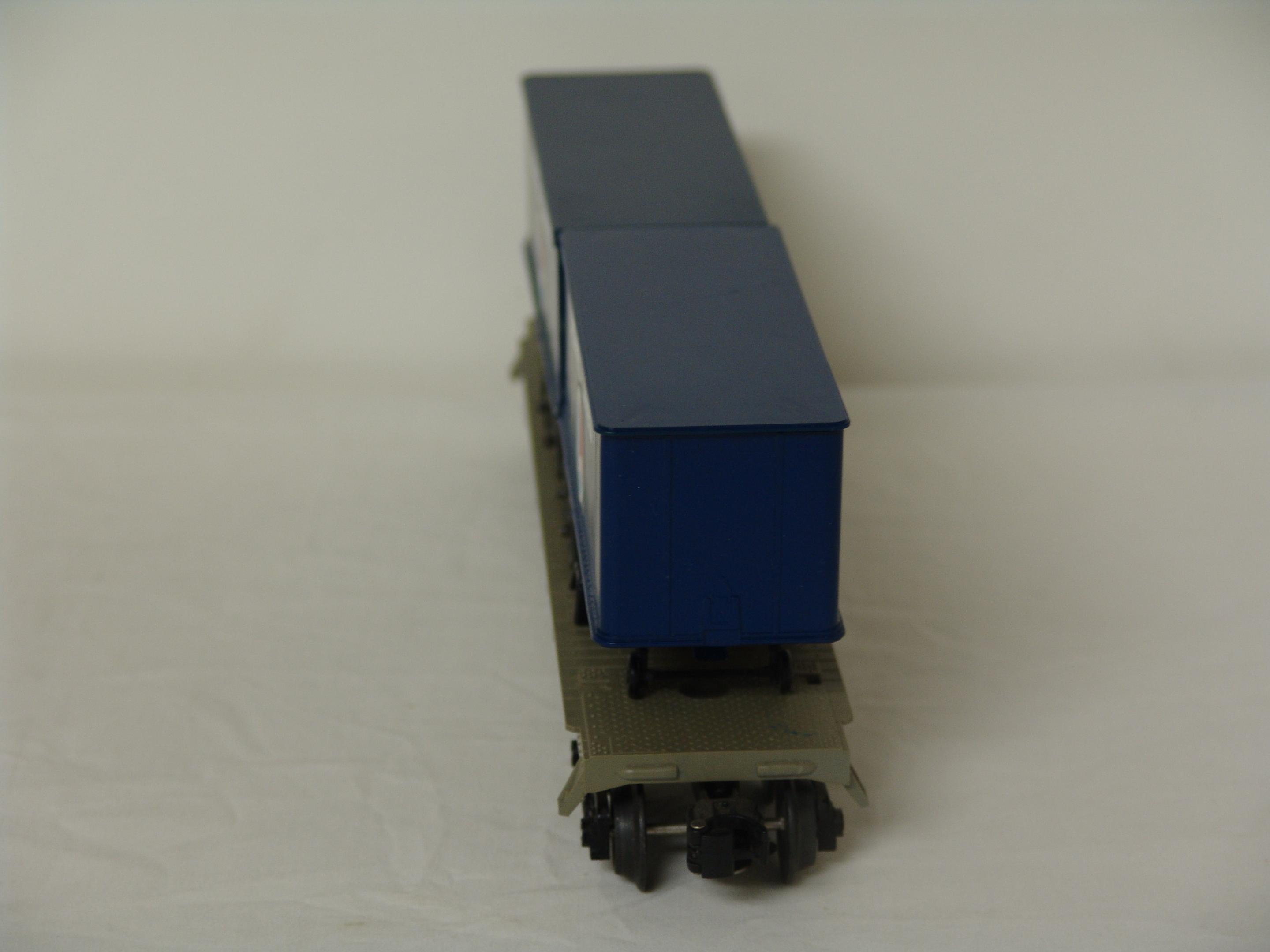 Lionel Lines flatcar #16323 with trailers (used)
