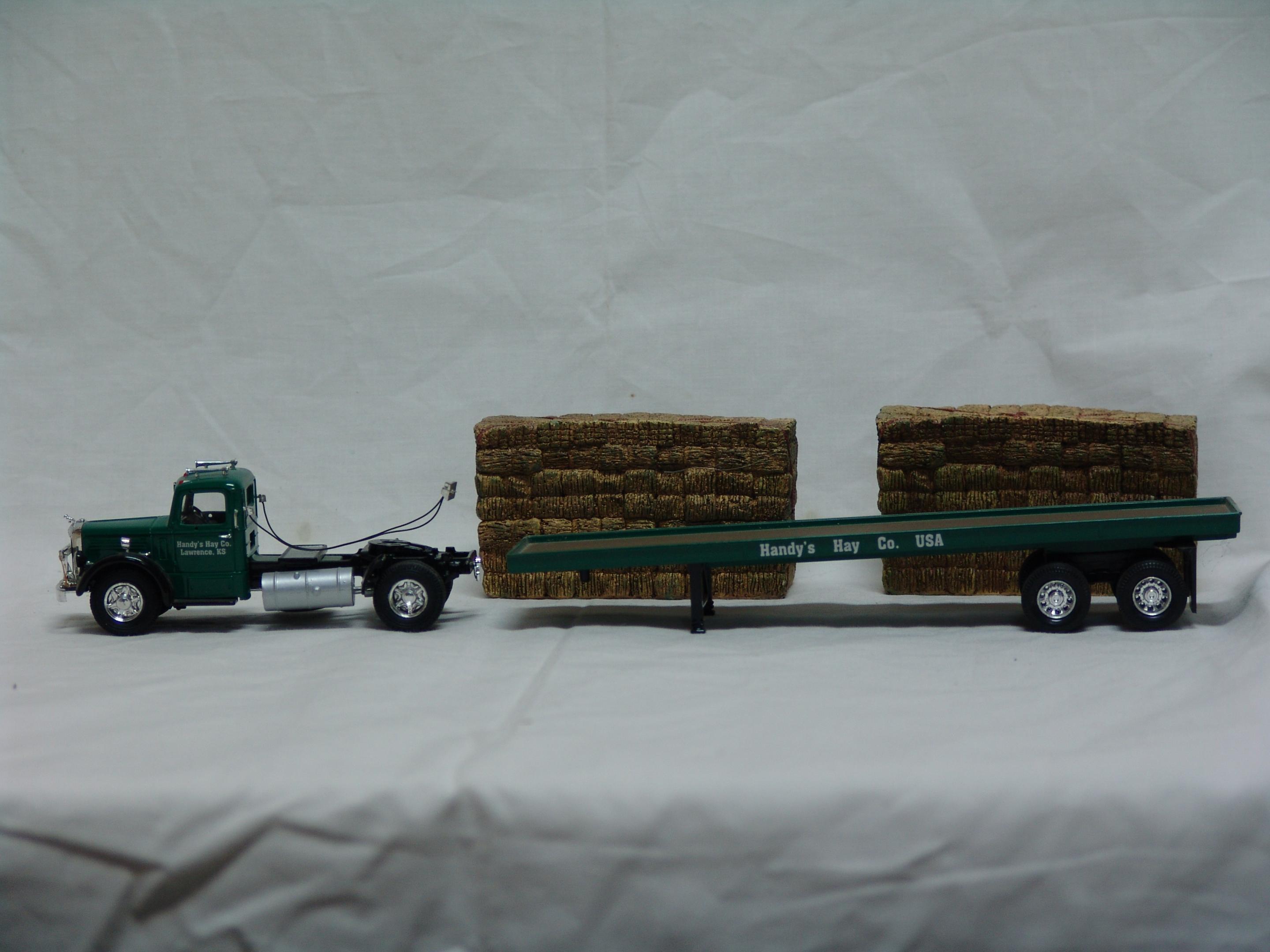 Mack LJ flatbed with hay load