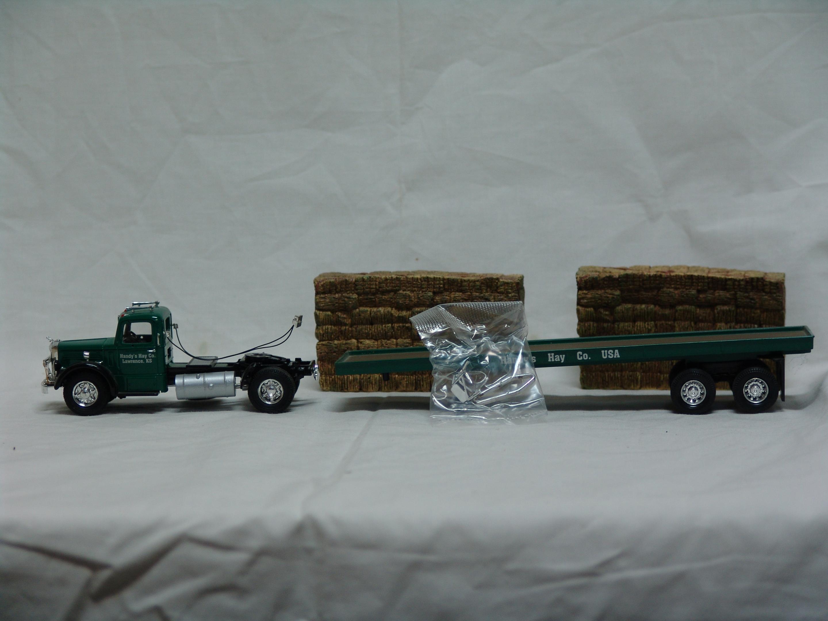 Mack LJ flatbed with hay load