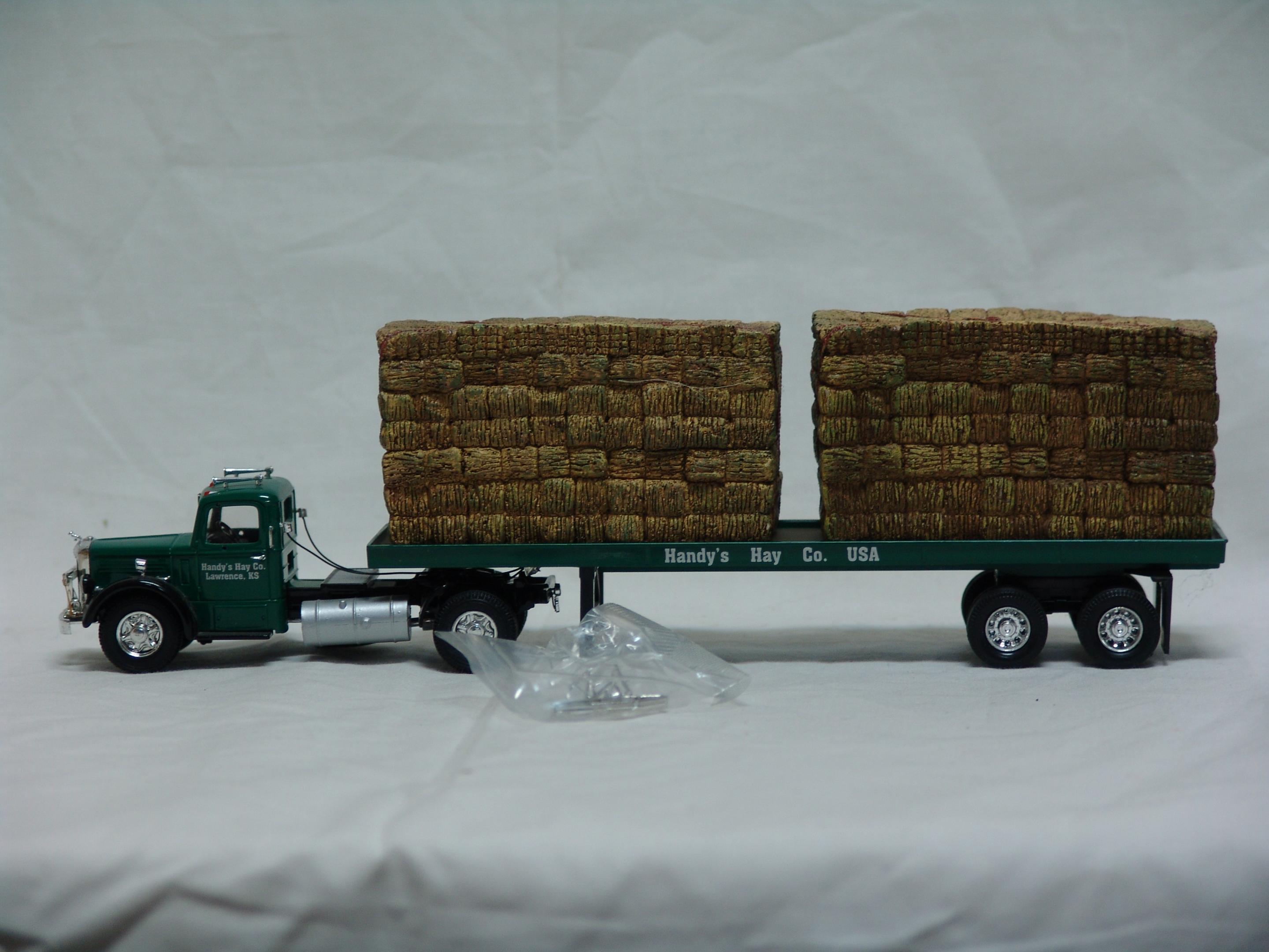 Mack LJ flatbed with hay load
