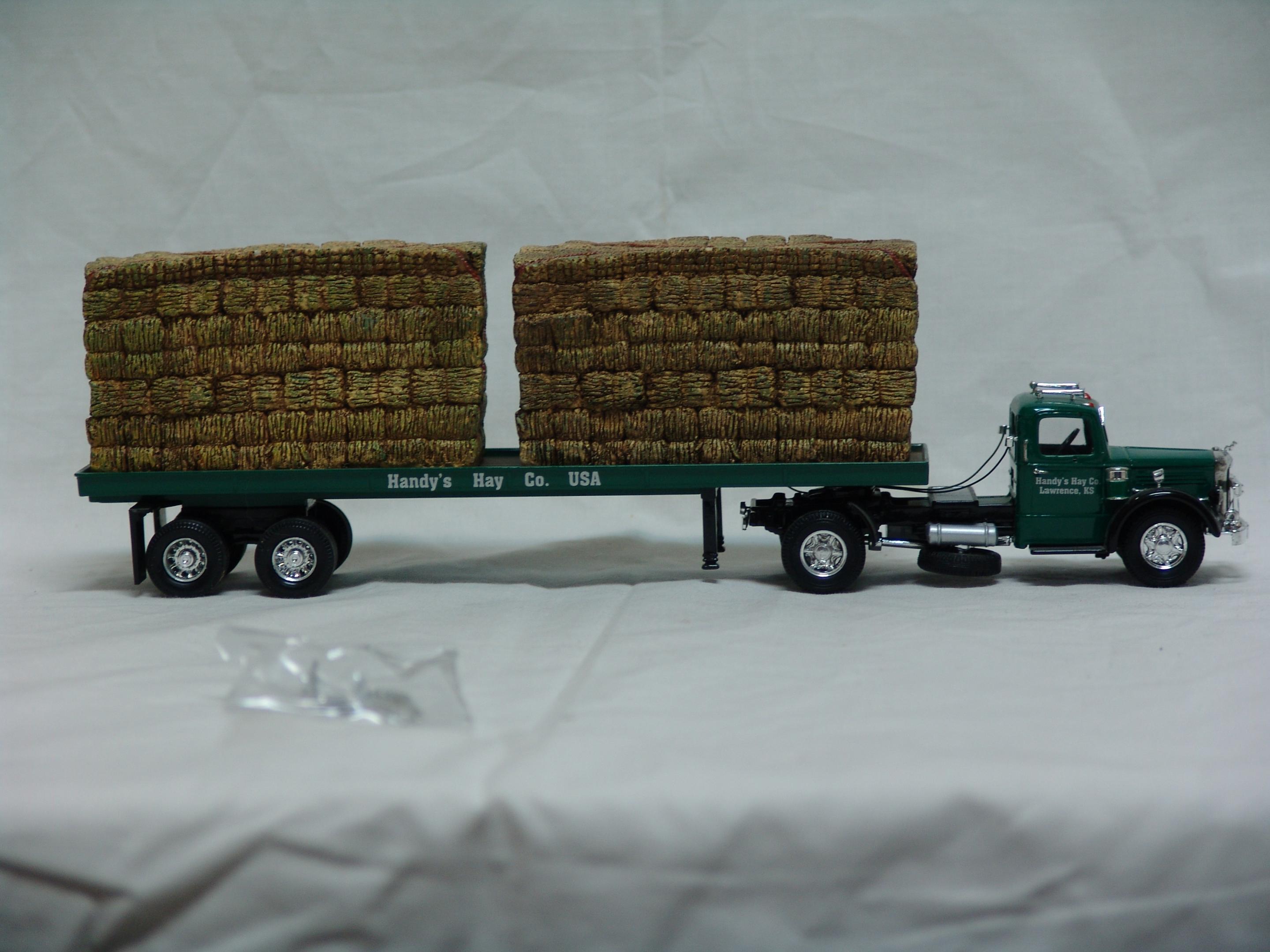 Mack LJ flatbed with hay load