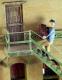 Lugging a Box Up Stairs figure