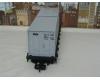 black flatcar #4069 with two containers (yellow box, used)