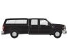 Ford F-350 crew cab pickup truck - black with utility cap