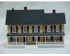 tan with dark brown shutters country house (used)