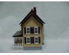 tan with dark brown shutters country house (used)