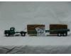 Mack LJ flatbed with hay load